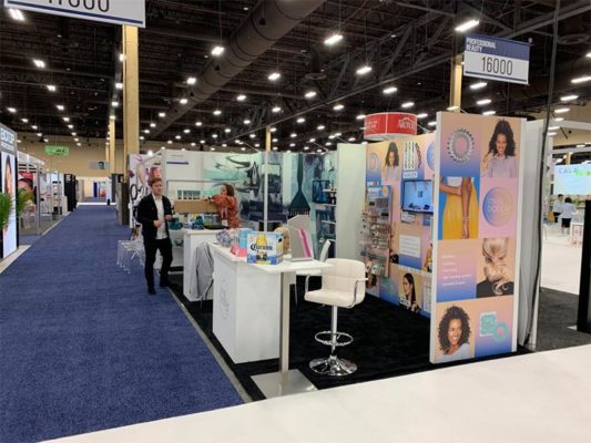10x20 Trade Show Booth Rental Package 222 - Invisibobble and Urban Alchemy - LV Exhibit Rentals in Las Vegas