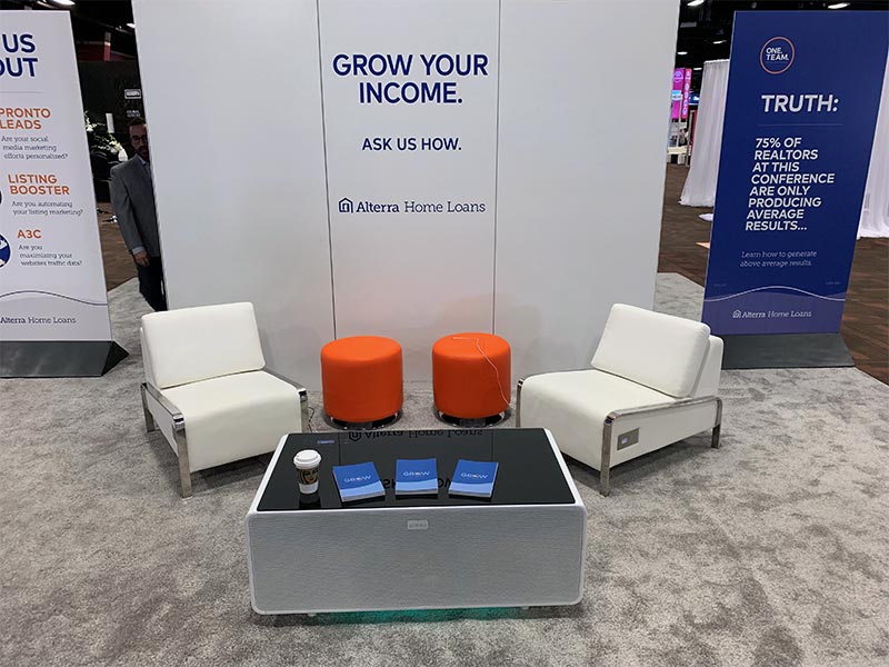 Jolt USB Lounge Chairs with Small Orange Domani Ottomans and Jolt Sobro Coffee Table - LV Exhibit Rentals in Las Vegas