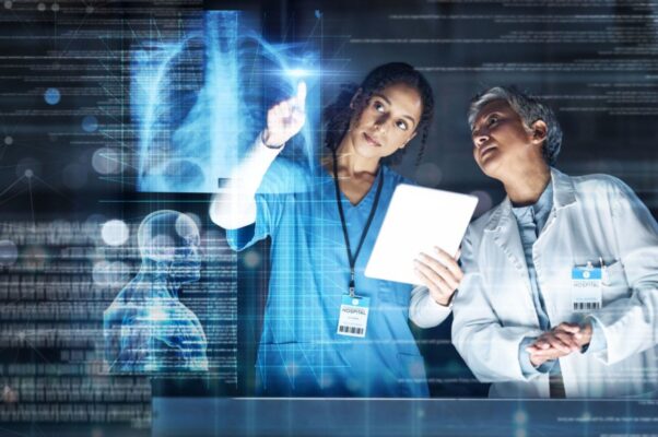 Two medical specialists looking at an exray