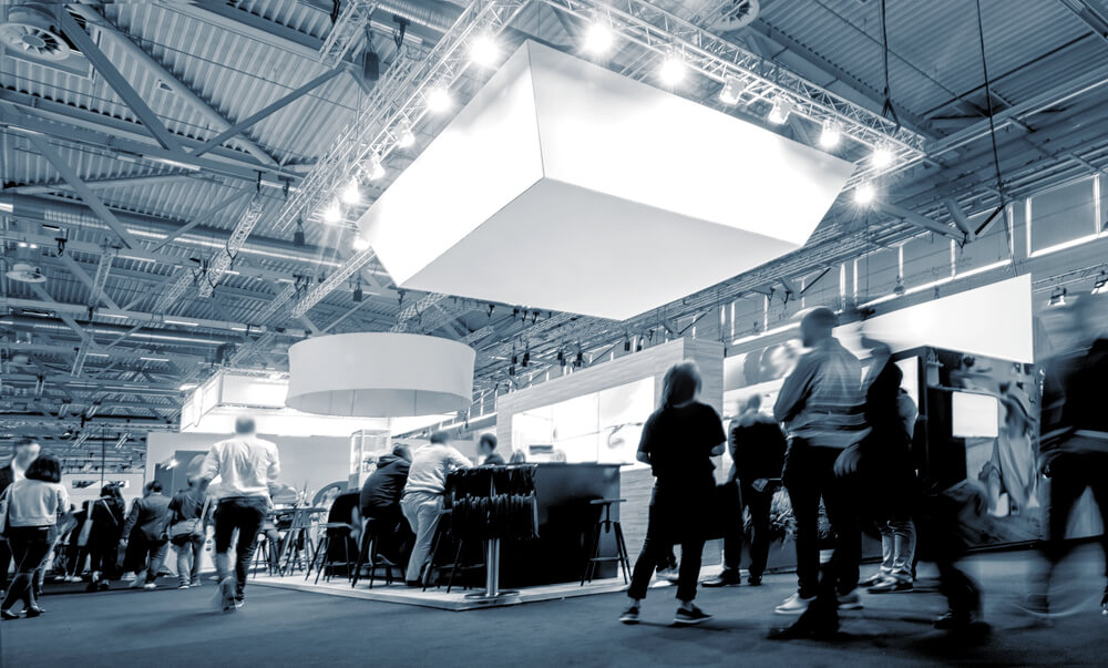 Looking at how to attract customers at a trade show? Give attendees a reason to stop.